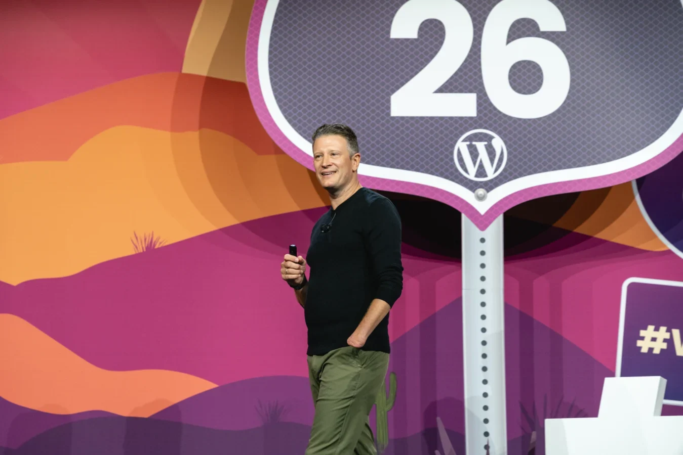 Loyal Pyczynski speaking on stage